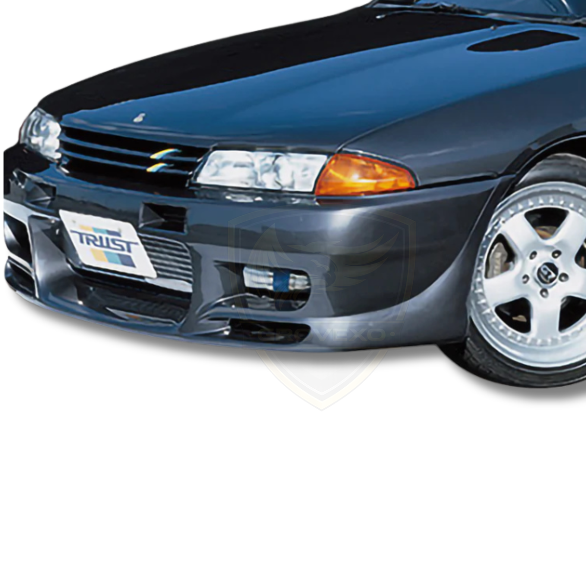 Front view of a dark-colored car with a visible brand logo on a white background